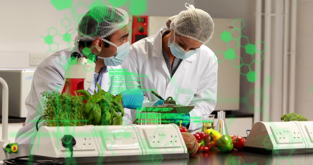 Pesquisadores em laboratório moderno desenvolvendo soluções para produtividade e sustentabilidade no agro.